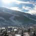 Hotel Planaiblick in Schladming with snowy mountain and village views under a bright sky