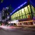 Hotel 99 Cubao in Manila near Araneta Coliseum at night with lit street and palm-lined road