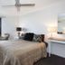 Surfers Plaza Resort in Surfers Paradise guest room with queen bed and city-view balcony