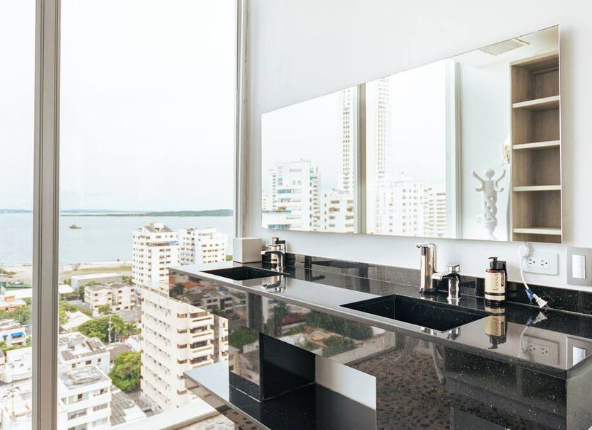 Hotel Zi One Luxury in Cartagena bathroom with double vanity and floor-to-ceiling ocean view