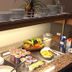 Hotel Sonneck in Schwäbisch Hall breakfast buffet with fruit, yogurt cups, cereal and tableware