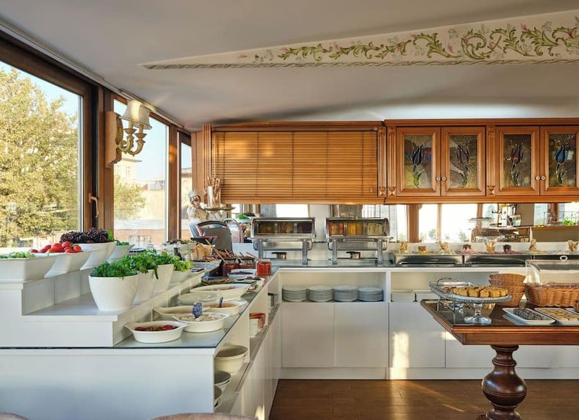 1207 Hotel Special Class Sultanahmet in Istanbul breakfast buffet with pastries and fruit in a bright dining room