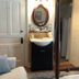 Terrell House B&B in Burnsville guest room with vanity, bathroom doorway, and four-poster bed