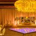 Planet Hollywood Adult Scene Cancun ballroom with illuminated dance floor and crystal chandelier in Cancún