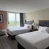 Silver Beach Hotel in Saint Joseph guest room with two queen beds and a balcony view