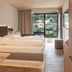 Goldener Adler Oberried guest room with twin beds and balcony view to the mountains