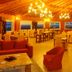 Aikendor Hotel Panoramico in El Calafate with warm-lit dining room and panoramic windows