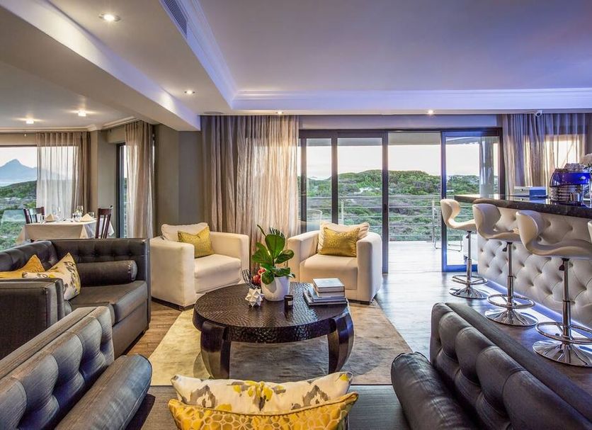 Bliss Boutique Hotel in Cape Town living room with balcony and mountain or sea view