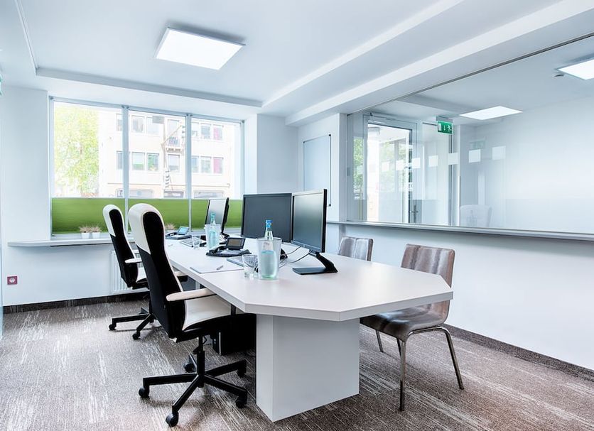 Garner Hotel Bremen City By IHG office-style meeting room in Bremen with desk, chairs and large windows