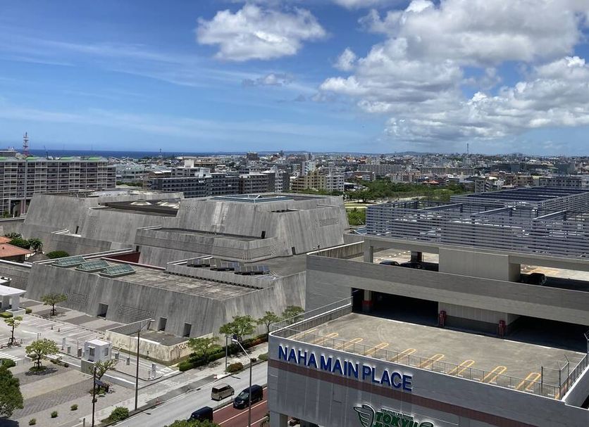 Toyoko Inn Okinawa Naha Shintoshin Omoromachi in Naha with city skyline and rooftop parking view