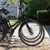 Kragsbjerggaard in Odense with bicycles parked on a sunny cobblestone courtyard