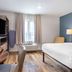 Extended Stay America Suites - Boston - Saugus guest room with bed, TV, desk and window