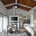 Grand Geneva Resort & Spa Lake Geneva suite with vaulted wood ceiling, king bed, kitchen, and balcony doors