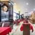 Marlight Boutique Hotel, Izmir restaurant interior with red tablecloths, upholstered chairs and decorative vases