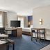 Residence Inn by Marriott Chicago Naperville/Warrenville studio suite with bed, desk and kitchenette in Warrenville
