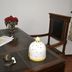 Monte das Palmeiras Ferreira do Alentejo desk with flowers, papers and a decorative ceramic lamp