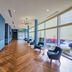 Four Points by Sheraton Raleigh Durham Airport lobby hallway in Morrisville with blue walls and large windows