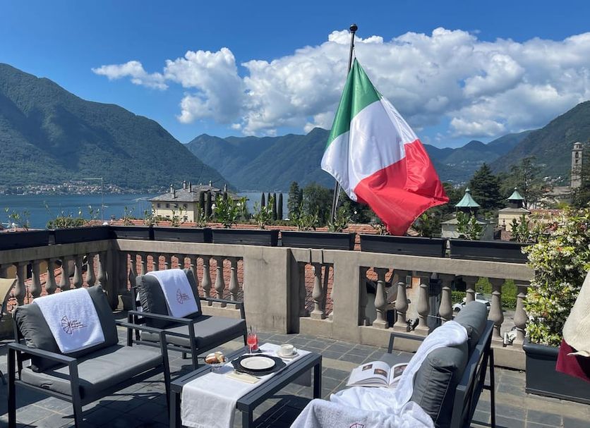 Casa Brenna Tosatto Art Experience terrace seating with Lake Como and mountain views in Lenno