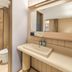 Hanting Harbin Convention and Exhibition Center Hengshan Road Branch bathroom with shower, toilet and sink
