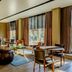 Buenos Aires Ezeiza Airport Marriott lounge with leather seating and large floor-to-ceiling windows in Buenos Aires