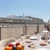Residhotel Le Grand Prado Marseille rooftop terrace with table setting and city view