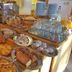 Hotel Centrale in Auronzo di Cadore breakfast buffet with pastries, bread, eggs, and drinks
