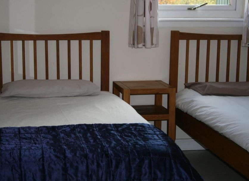 BCC Loch Ness Hostel in Inverness: twin room with two single beds and a window