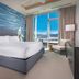 Hotel Indigo Asheville Downtown guest room with king bed and city-view window in Asheville