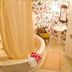Fairfield Manor Bed and Breakfast in Shreveport: butterfly wallpaper, clawfoot tub, pedestal sink and mirror