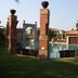 Velmore Hotel & Spa in Pretoria with a landscaped pool framed by brick pillars and arches