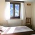 Hotel Meublè Adler room in Santa Caterina Valfurva with twin bed, window and mountain view