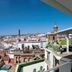 abba Sevilla rooftop terrace with city views over Seville and the cathedral skyline