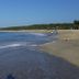 Hotel Caracol Plaza, Puerto Escondido: sandy beach with gentle waves and distant shoreline