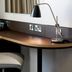 Premier Inn Norwich City Centre - Duke St desk chair and lamp in a guest room, Norwich