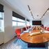 Bilderberg Grand Hotel Wientjes in Zwolle meeting room with oval conference table and red chairs