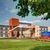 Fairfield Inn & Suites by Marriott Madison West/Middleton in Middleton with a covered entrance and landscaped lawn