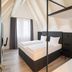 Dormero Hotel Schwäbisch Hall bedroom with twin beds and sloped ceiling in Schwäbisch Hall