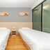 Hi Inn Shanghai Hongqiao Railway Station twin room with two single beds and window in Shanghai