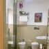 Sangiuliano114 B&B bathroom in Catania with glass shower, bidet, toilet and sink