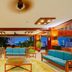 Guesthouse International Hotel Sanya lobby with ocean view and blue sofas in Sanya