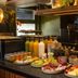 Hôtel Aoriste & Spa in Paris buffet with fresh fruit, pastries, juices, and breakfast dishes