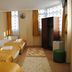 Lotus Hotel Istanbul triple room with three single beds, windows, wardrobe and patterned rugs