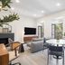 Sosuite at French Quarters - Rittenhouse Square living area with balcony doors and tree views in Philadelphia