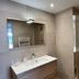 Résidence Les Cigales, Porto-Vecchio bathroom with sink, mirror and walk-in shower