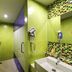 Ibis Styles Kuala Lumpur Fraser Business Park bathroom with walk-in shower and wall-mounted hair dryer