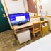 Toyoko Inn Ichinoseki Ekimae room with desk, TV, chair and single bed in Ichinoseki