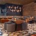Radisson Blu Resort, Trysil lounge bar with seating, low tables and deer wall art in Innbygda