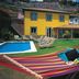 Village Cabo Girao in Câmara de Lobos with outdoor pool, hammock, and hillside rooms