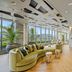 Coda on Half, a Placemakr Experience in Washington, D.C.: bright lobby with curved sofa and city views