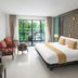 Centara Anda Dhevi Resort & Spa Krabi room with king bed, balcony, and pool or garden view in Ao Nang